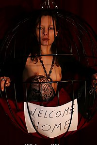 Caged slavegirl is waiting for her master