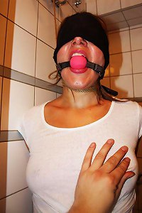 Perfect time for tits grabbing and nipples twisting is when the girl is gagged, blindfolded, tied up and wet in the shower  Submissed
