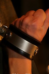 Girl restrained with cuffs and gets punished